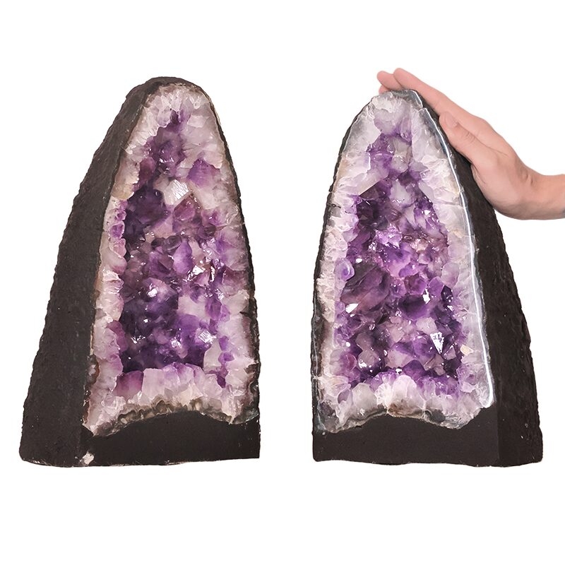 Amethyst geodes displayed as a pair showing stunning natural symmetry.