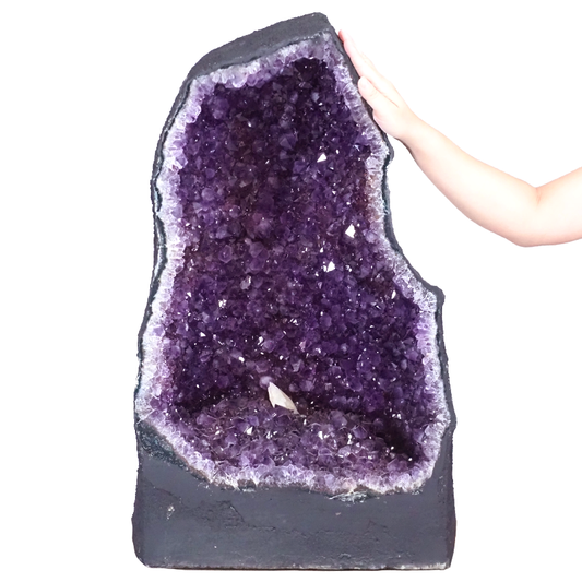 Amethyst cave crystal with deep purple A-grade points.