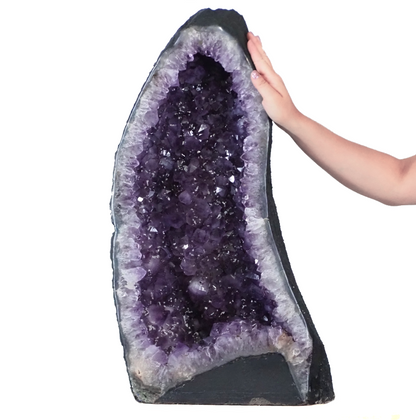 Amethyst geode rock with A-grade crystal interior and polished cut edges.