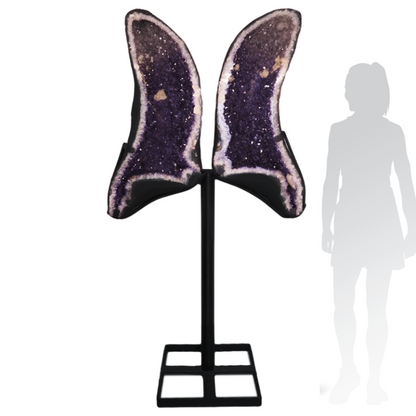 Amethyst butterfly wings showing natural crystal symmetry on metal stand.