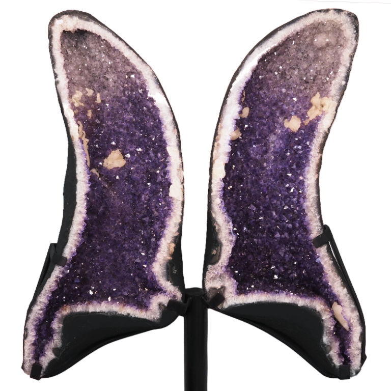 Amethyst crystal wings displayed as a split geode pair with polished faces.