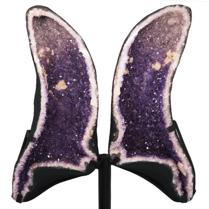 Amethyst crystal wings displayed as a split geode pair with polished faces.